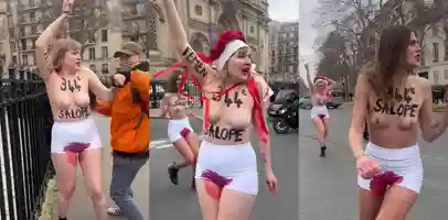 几位赤裸上身下身白裤染红的美女在法国巴黎的街头高呼抗议：堕胎是妇女的权利