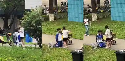 华南农业大学大瓜 一男子跪在女人面前 被女的狂扇耳光 同学们都惊呆了